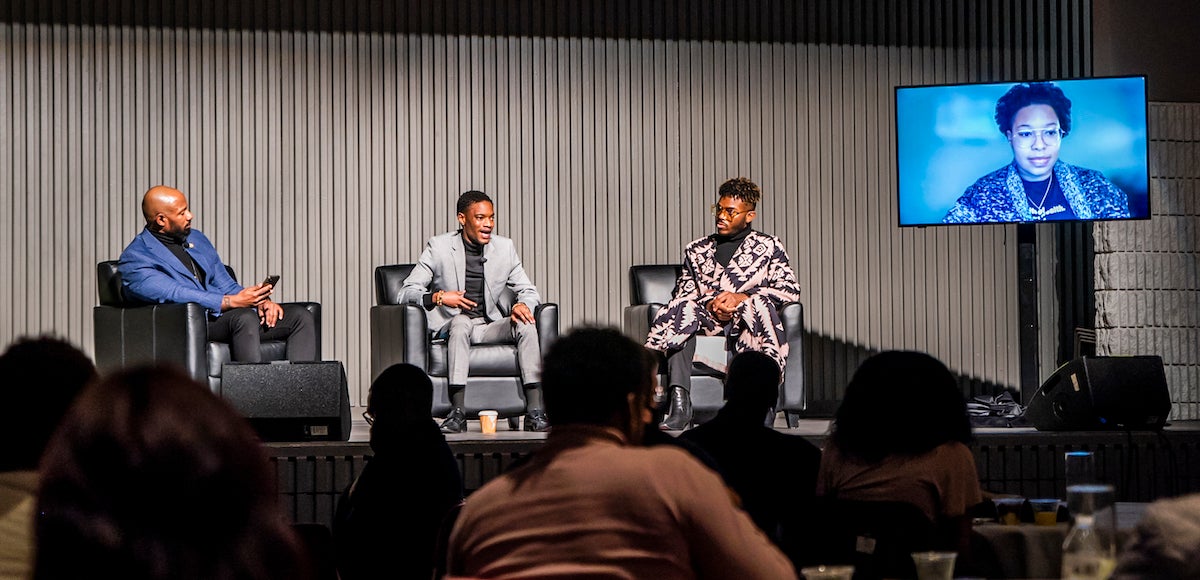 four panelists speaking
