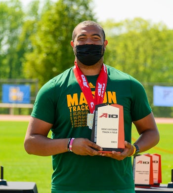 Jaylen Simmons holding trophy