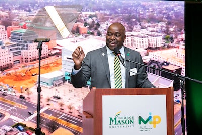 Pres Washington at podium