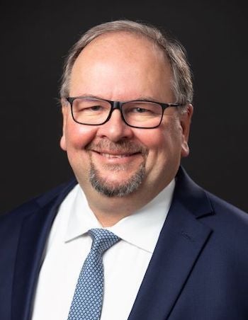 portrait of a man with glasses