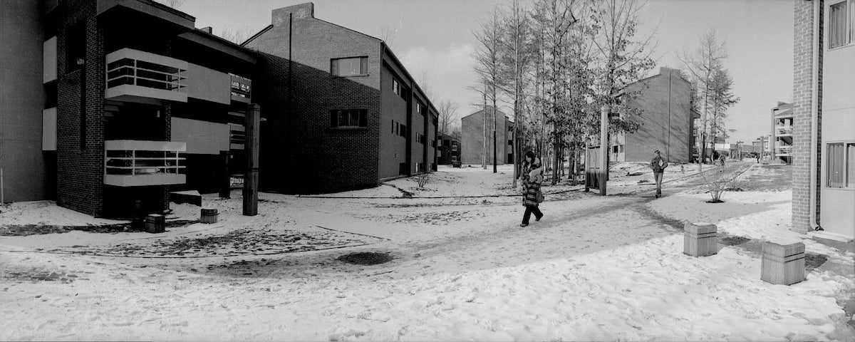 bw photo of apartment complex in snow