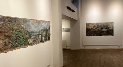 museum exhibit of landscapes