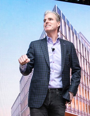 Paul Misener in front of a Fuse rendering