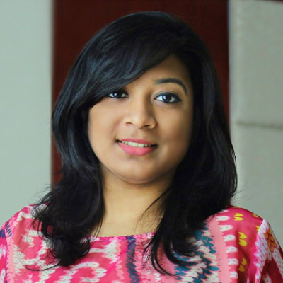 Zinat Ara, IST PhD student at Mason, wears a paisley-printed, pink blouse in her profile.