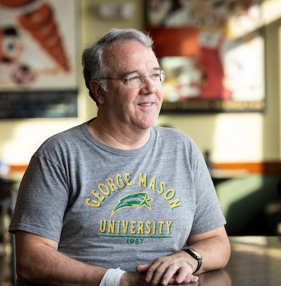 photo of Paul Vosti in mason t shirt