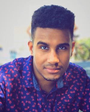 Headshot photo of Kirubel Fessesssework.