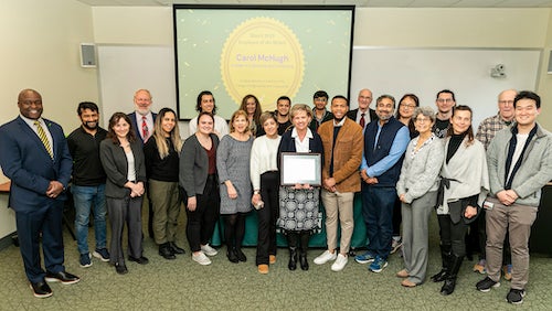 EOTM ceremony with a large group of people