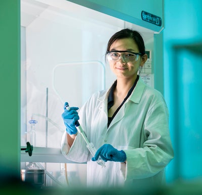 Pei Dong in her lab