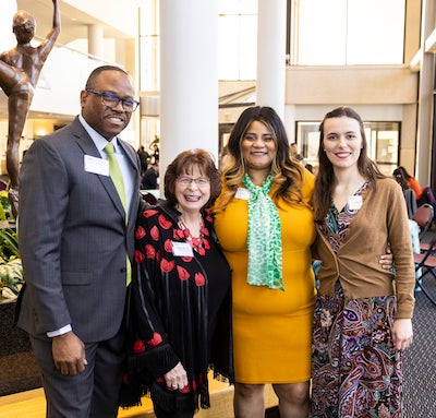 Tamara Nall and her husband with Dr. Monson
