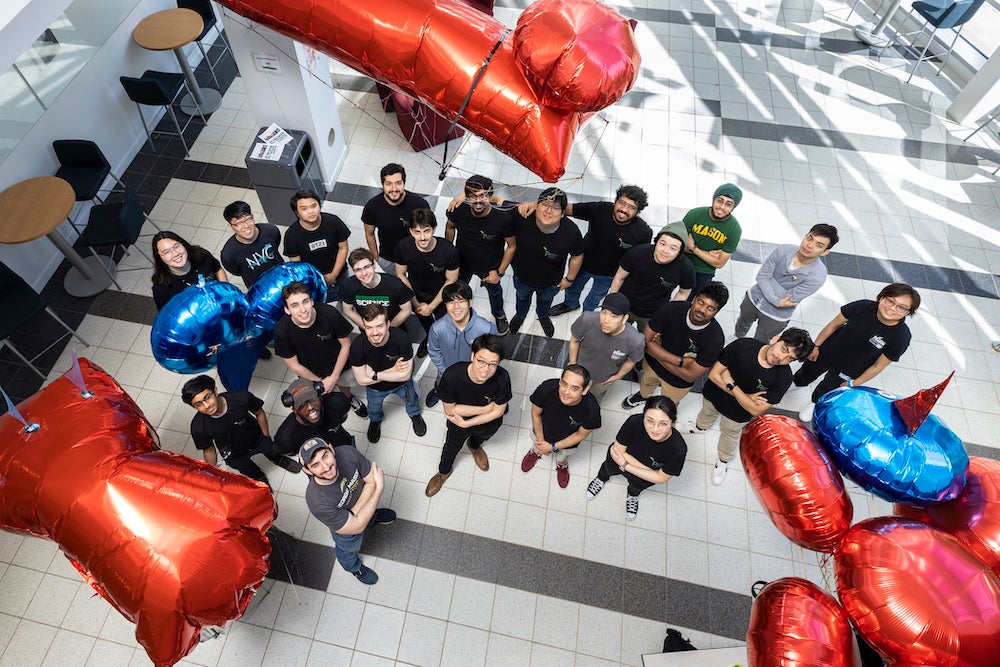 Patriot Pilots pose with their blimps