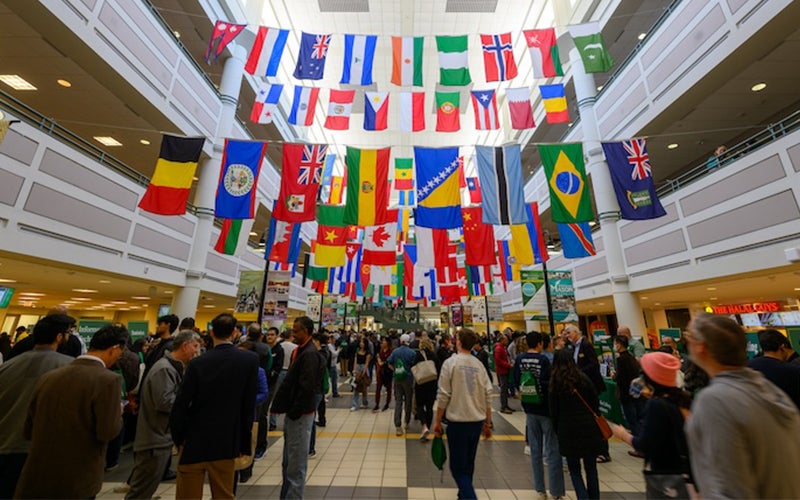 Students and family members meet with faculty and staff tabling in the Johnson Center during 2024's Spring Preview.