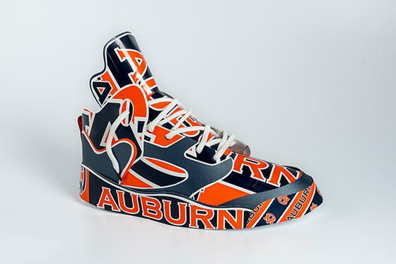 Air Jordan 5 replica constructed from recycled packing from well-known brands such as Lego, Barbie, Apple and even Auburn University—on view at the Jule Collins Smith Museum of Fine Art