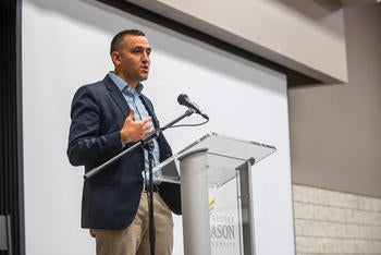Trevor Montano takes the stage as a keynote speaker at the Alpha Challenge