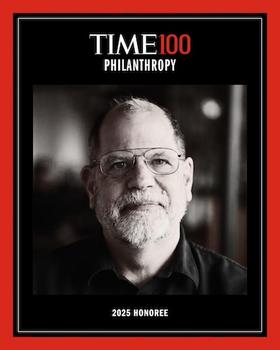 George Mason University economics professor and alumnus Tyler Cowen smiling on the cover of TIME magazine’s 100 most influential people in philanthropy