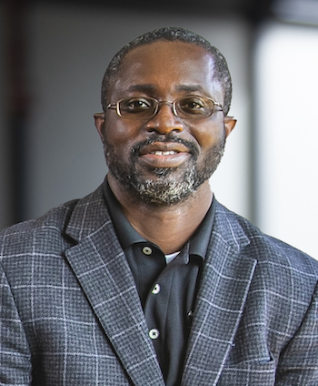 portrait of a man in a classroom