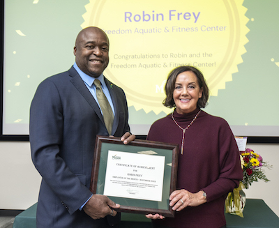 frey and dr washington with her plaque