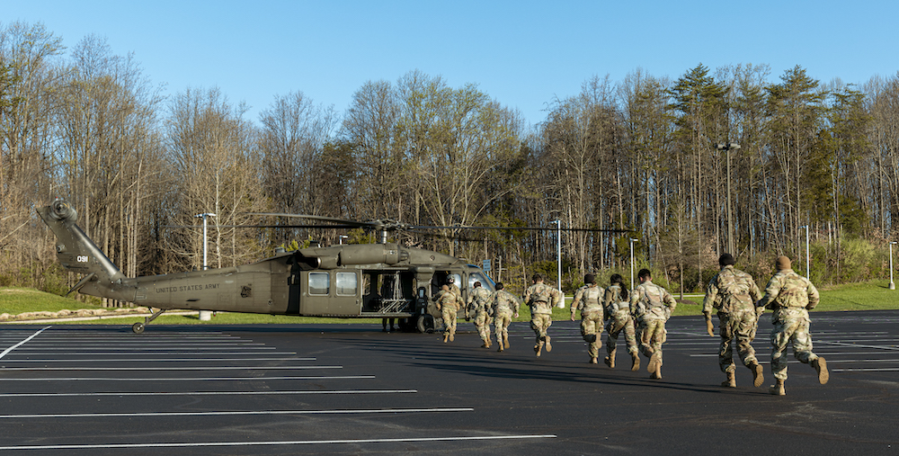 ROTC students getting on the Black Hawk helicopters