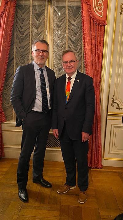 Dean Ozerdem at signing with Gordon McInally, President of Rotary International