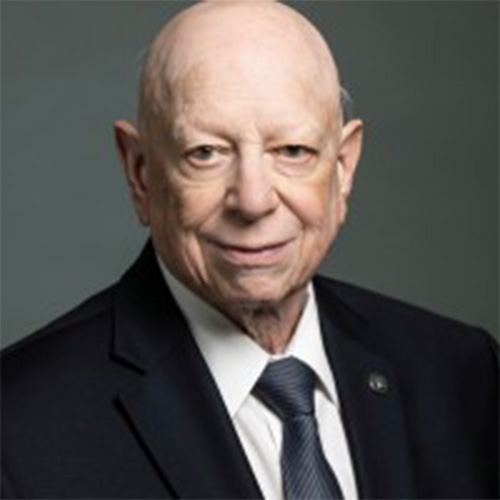 George Hazelrigg in a dark suit and tie