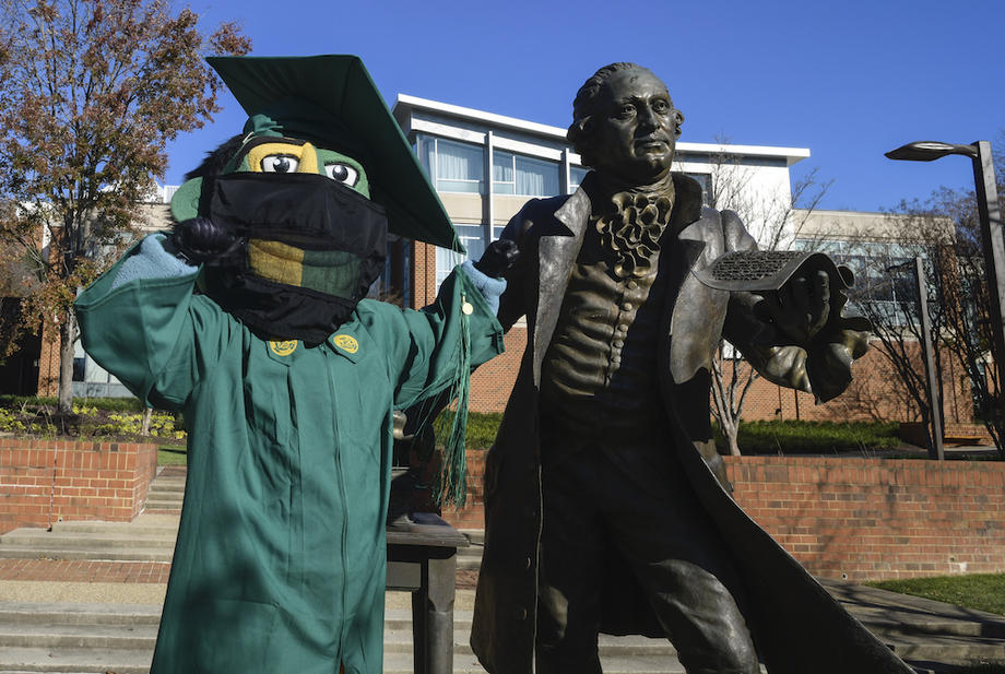 Mascot in cap and gown