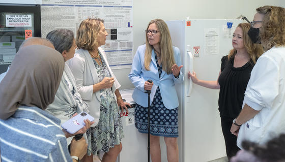 wexton in a lab with researchers