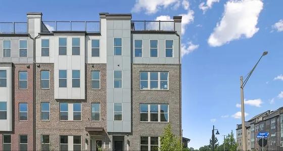 Exterior view of a four-story condominium building