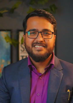 Portrait photo of Niamat Ullah