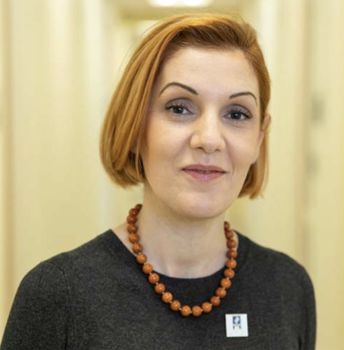 A headshot of a woman