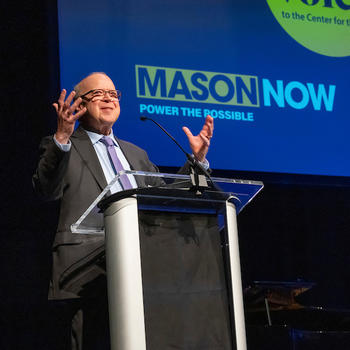 Rick Davis at a podium